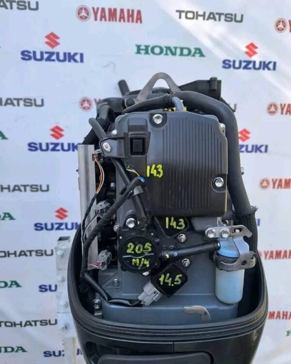Suzuki 40HP outboard with gauges and controls included