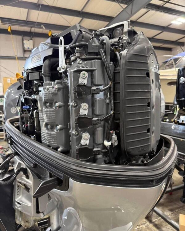 Low-hour Honda offshore outboard engine side profile