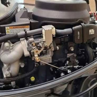 Compact Yamaha 15HP marine engine designed for small boats