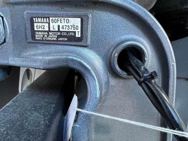 Lightweight Yamaha two-stroke outboard in immaculate condition