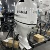 Side view of Yamaha F90 outboard engine showing compact marine design