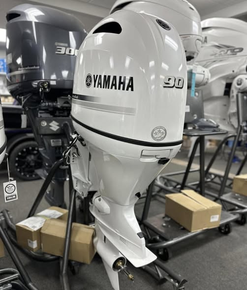 Side view of Yamaha F90 outboard engine showing compact marine design