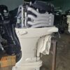 Suzuki 140HP inline four-cylinder marine engine side profile