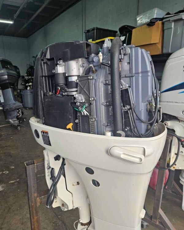 Clean Suzuki 140HP outboard ready for offshore boating use