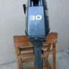 Lightweight Yamaha 30HP twin-cylinder marine engine side profile
