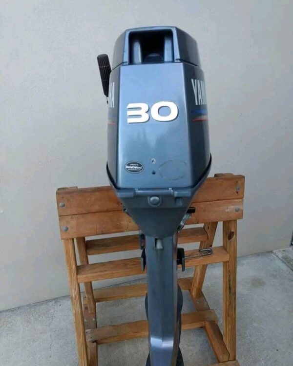 Lightweight Yamaha 30HP twin-cylinder marine engine side profile