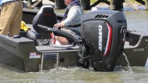 115 HP Evinrude outboard for sale mounted on fishing boat