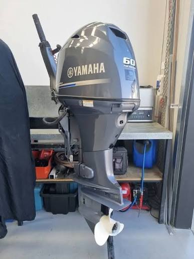 60HP 4 stroke outboard motor mounted on fishing boat in Australia