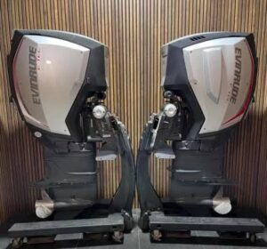Evinrude outboard motor for sale on fishing boat