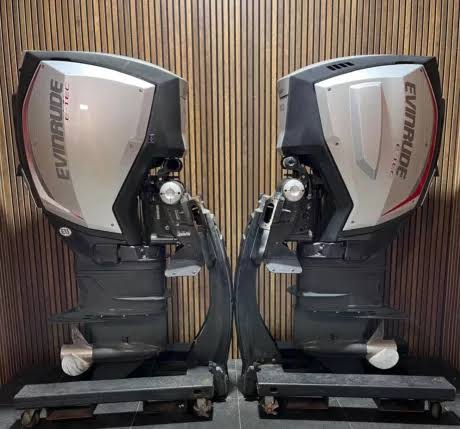 Evinrude outboard motor for sale on fishing boat